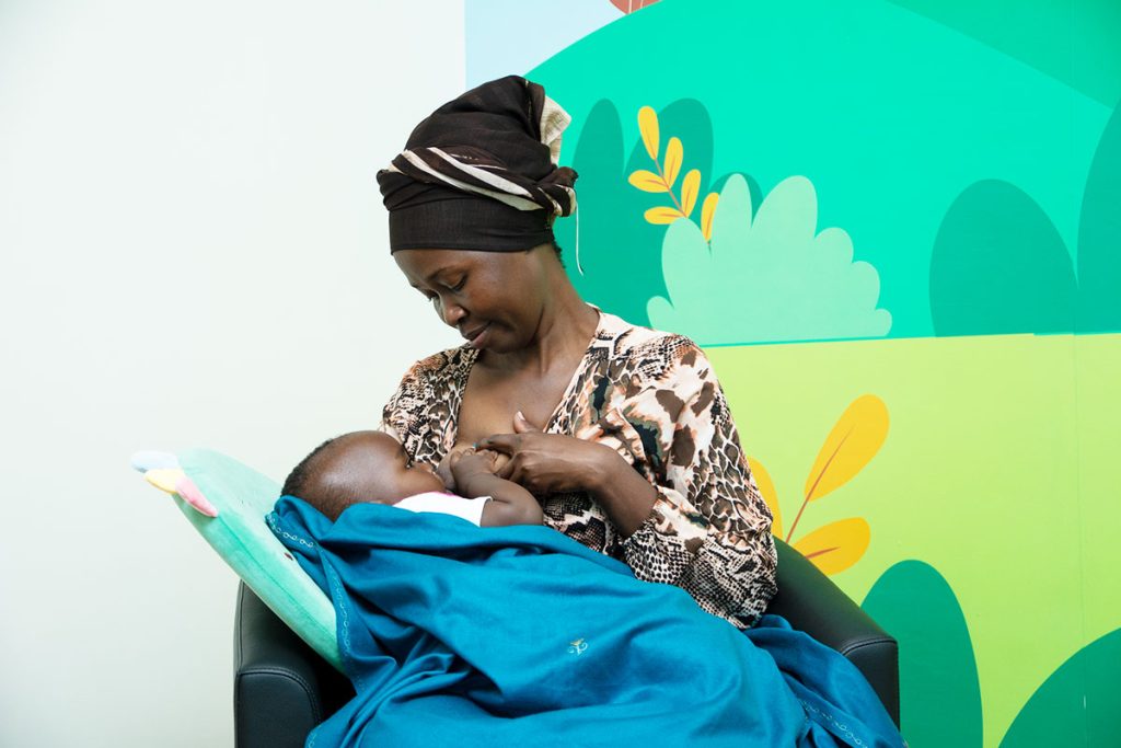 Mother breastfeeding her child